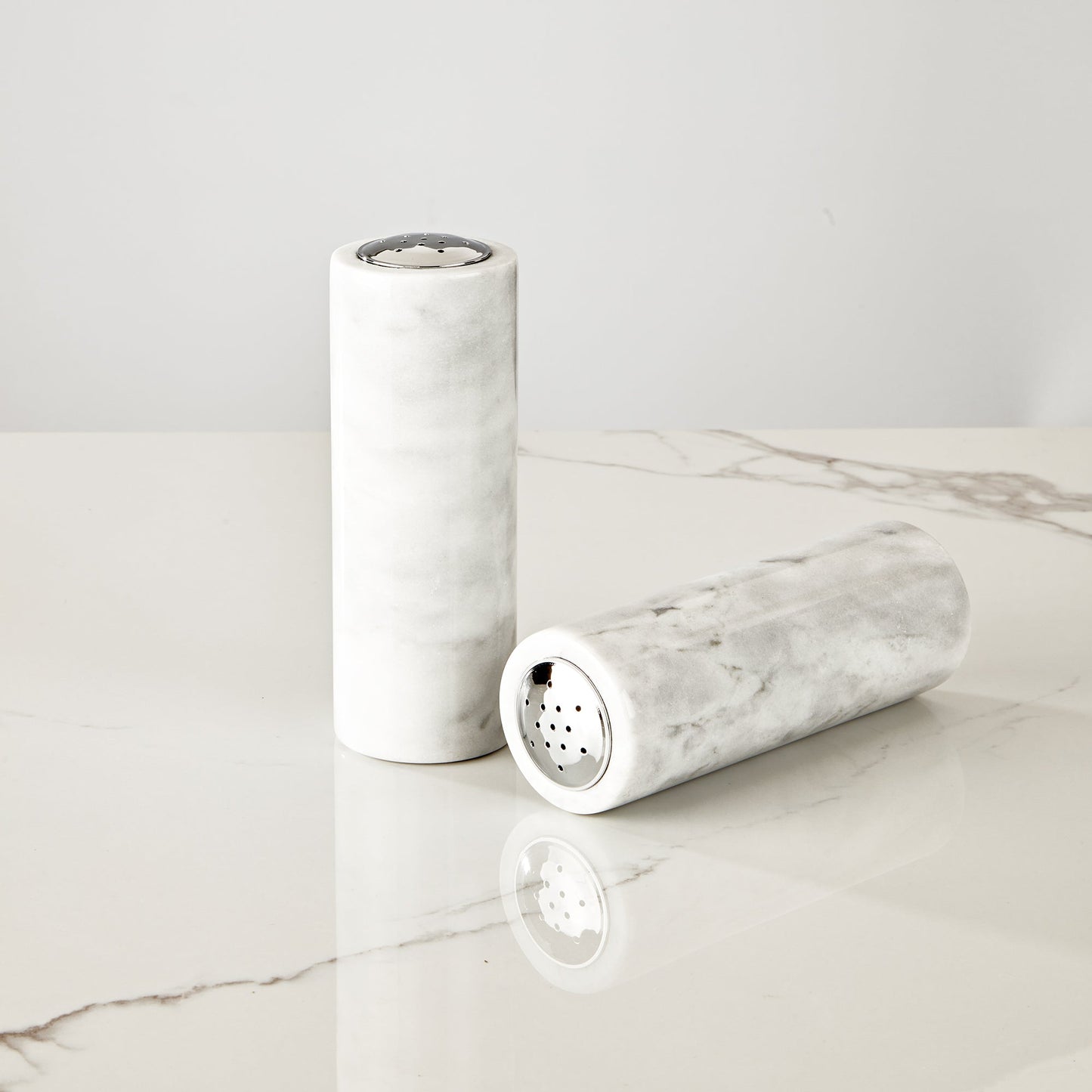 French White Marble Salt and Pepper Set with Grey Veining and Stainless Steel Shaker Plate for Stylish Kitchen and Dining Room Use